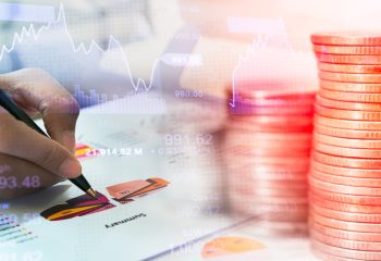 Businessman check seriously analyzes a financial reports. Financial reports are set of documents prepared by an administrative team at the end of an accounting period. Concept business finance