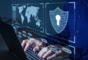 Cyber security and network protection with cybersecurity expert working on secure access internet to protect server against cybercrime. Person typing on computer keyboard late at night