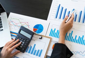 Top,View,Of,Business,Consultant,Meeting,To,Analyze,And,Discuss