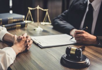 Good service cooperation, Consultation of Businesswoman and Male lawyer or judge counselor having team meeting with client, Law and Legal services concept.