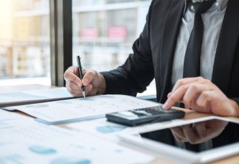 Businessman,Accountant,Working,Audit,And,Calculating,Expense,Financial,Data,On