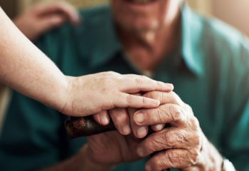 Hands,,Elderly,Man,And,Woman,In,Nursing,Home,With,Support Hands,,Elderly,Man,And,Woman,In,Nursing,Home,With,Support