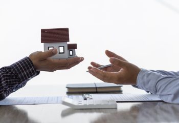 Real estate inheritance concept and contract agreement. The customer makes a rental contract with the landlord.